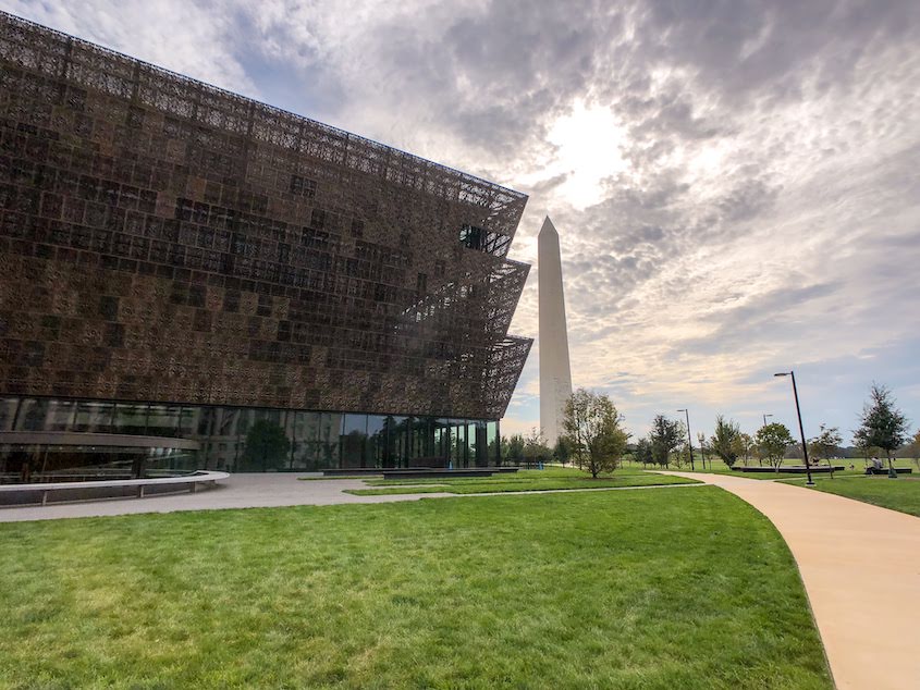 Smithsonian National Museum of African American History and Culture with Washington Monument in background
