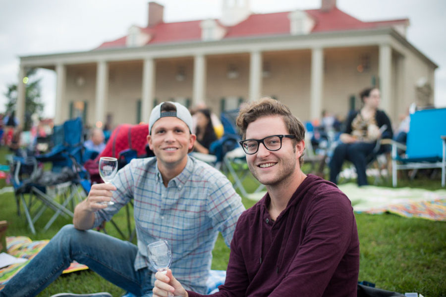 Photo of two people drinking wine at the Spring Wine Festival and Sunset Tour