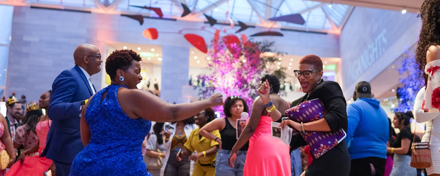 Guests dance and celebrate during a lively event at the National Gallery of Art in Washington, DC.
