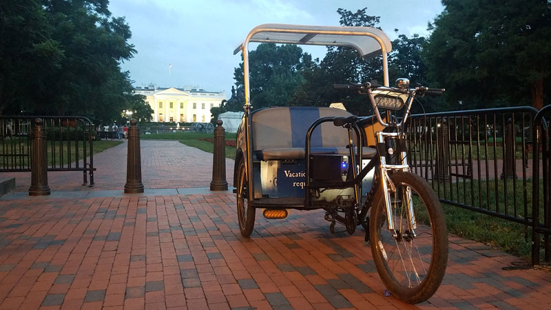 Adventure DC Tricycle Tours vehicle in front of White House - Eco-friendly tours in Washington, DC