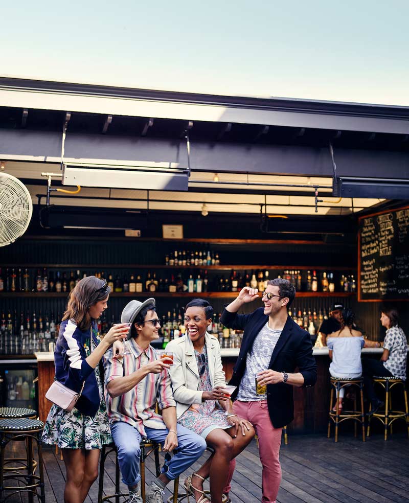 Group of friends at Marvin rooftop on 14th Street - Summer in Washington, DC