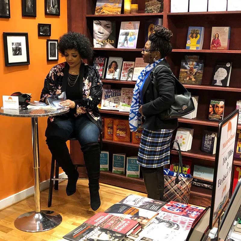 Shoppers at MahoganyBooks - Independent bookstore in DC's Anacostia neighborhood