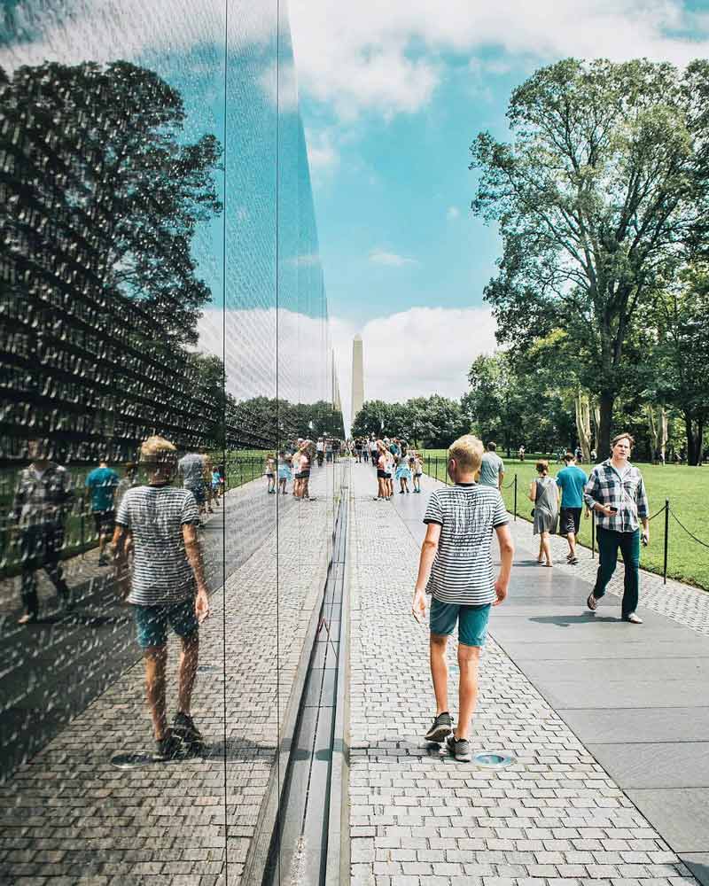 @elalvarortiz - Summer scene at Vietnam Veterans Memorial on the National Mall - History and heritage site in Washington, DC @elalvarortiz - Summer scene at Vietnam Veterans Memorial on the National Mall - History and heritage site in Washington, DC