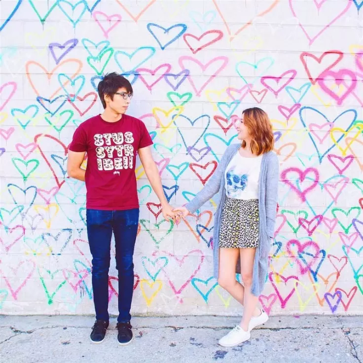 @deercher - Couple holding hands at Union Market Heart Wall mural - Attractions in Washington, DC