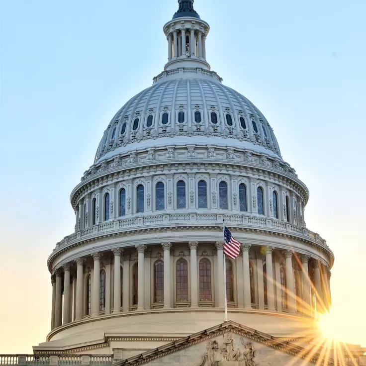 Sun setting from the east side of the US Capitol