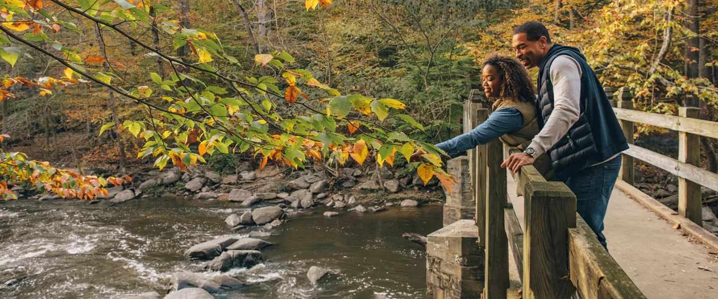 Couple on bridge at Rock Creek Park