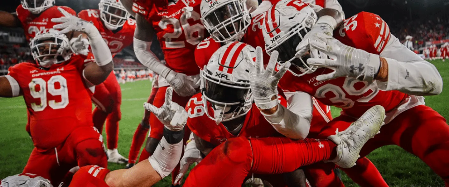 DC Defenders posing after a touchdown for the camera