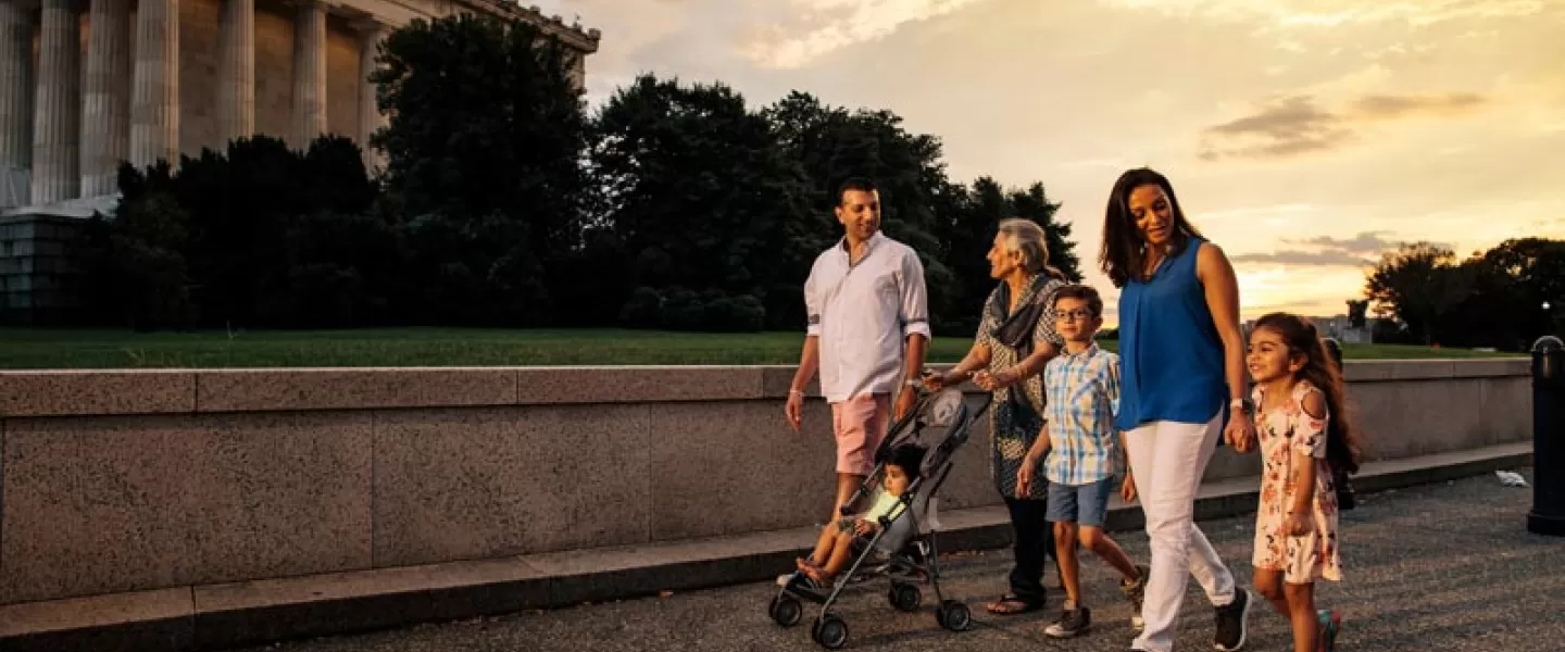 Family walking on the National Mall - How to tour the monuments and memorials in Washington, DC