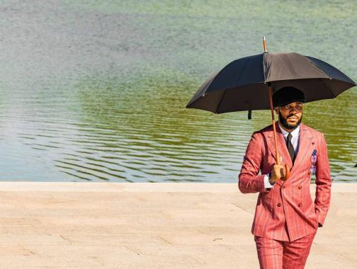 @awphotos84_ - Man with umbrella near national mall 