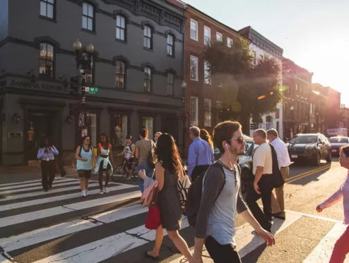 Walking across M Street NW in Georgetown - The best ways to get around Washington, DC